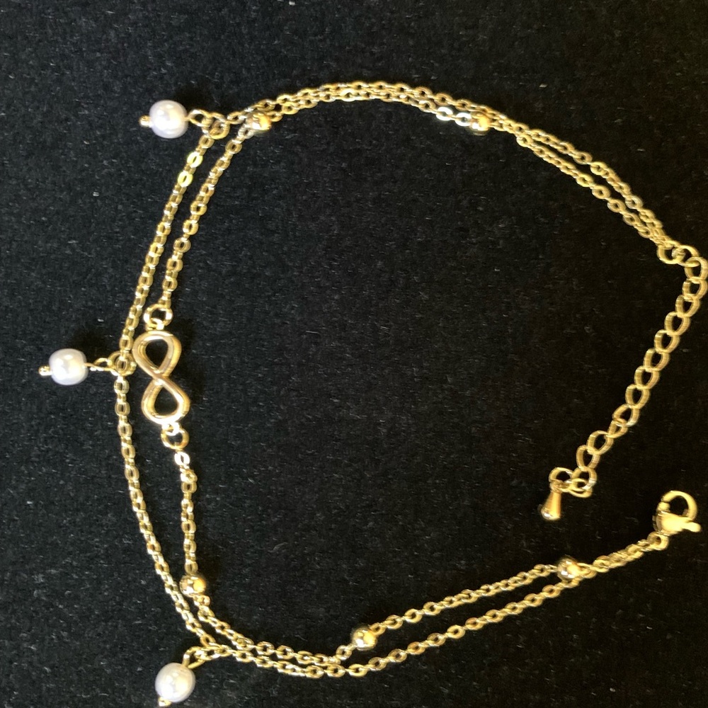 Brand new. Beautiful ankle bracelet. 8.5 inches with a 2 inch extender.